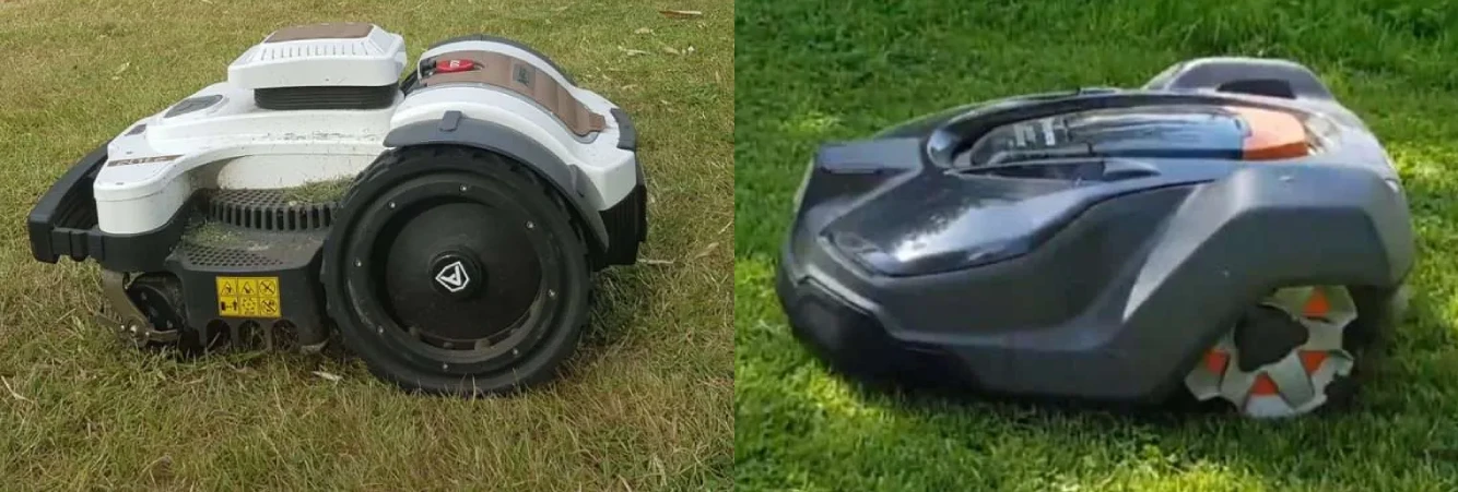 Comparison of two robotic mowers: a white RTK model and a dark, sleek mower with orange hub wheels.